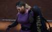 Serena Williams, of the United States, leaves the court at