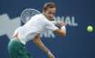 Daniil Medvedev, of Russia, returns a ball to Hubert