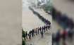 New Delhi: Passengers lined up outside the Akshardham Metro