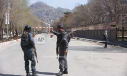 Police patrol the streets after a suicide attack in front