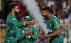 Pakistan's Haris Rauf celebrates the dismissal of New Zealand's Martin Guptill during the Cricket Tw
