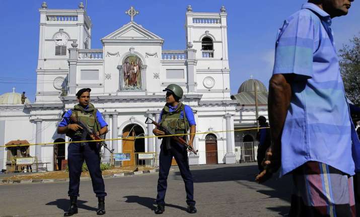 Soldiers stand guard in front of the St. Anthony's Shrine a