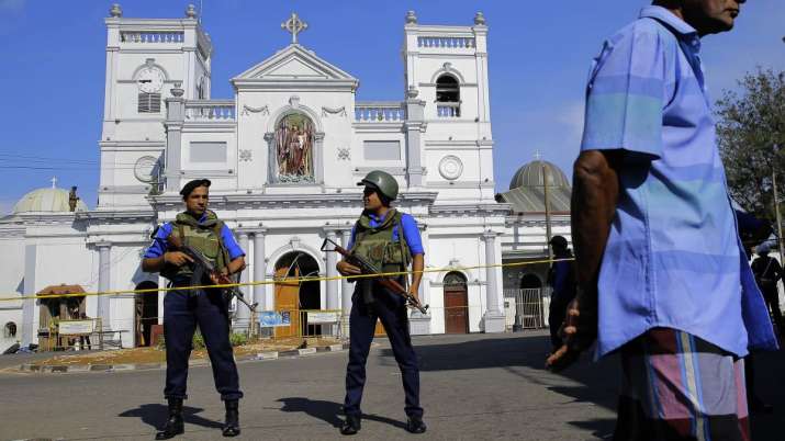 Soldiers stand guard in front of the St. Anthony's Shrine a